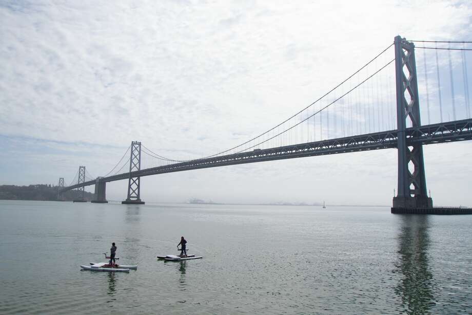 Biking near the Bay Bridge while testing out a Schiller water bike on May 23, 2019. Photo: Chris Preovolos
