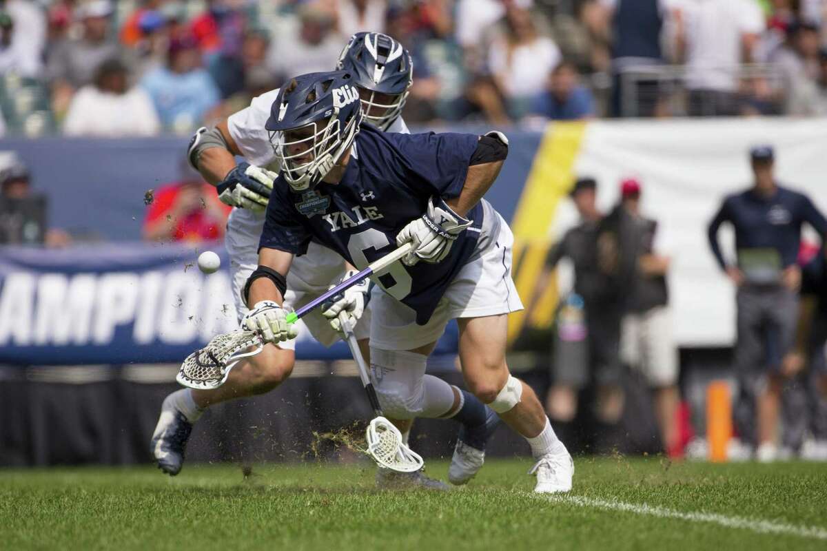 Yale’s TD Ierlan (6) wins a face-off against Penn State’s Gerard Arceri (40) in the first quarter of the 2019 NCAA Division I Men’s Lacrosse Championship Semifinals at Lincoln Financial Field on Saturday in Philadelphia.