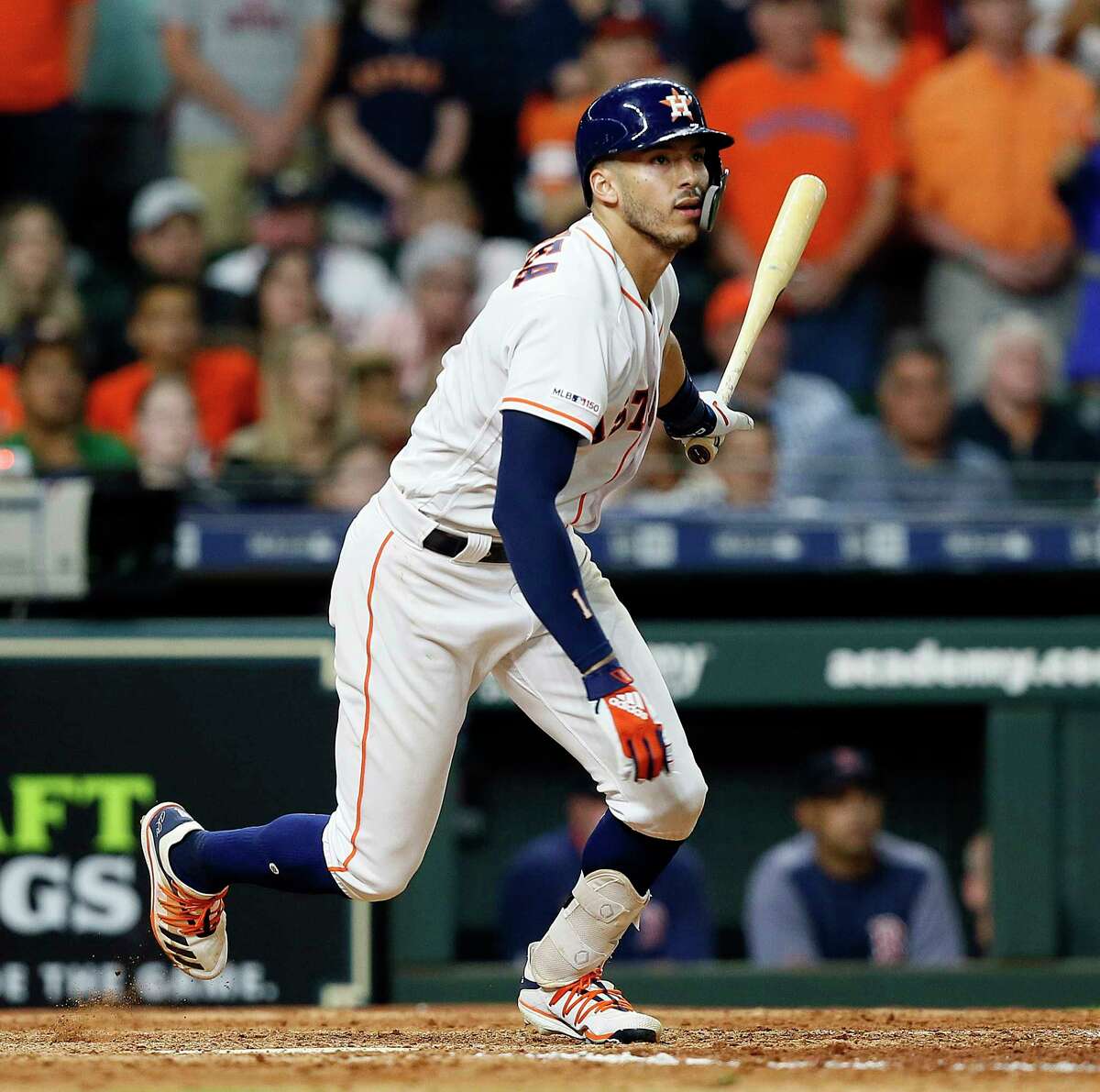 HOUSTON, TEXAS - MAY 25: Carlos Correa #1 of the Houston Astros hits a walk off single in the ninth inning against the Boston Red Sox at Minute Maid Park on May 25, 2019 in Houston, Texas. (Photo by Bob Levey/Getty Images)