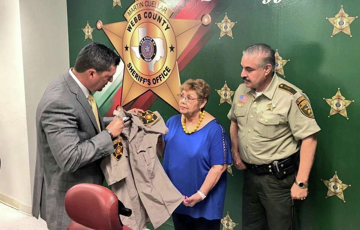 Laredo mother reunited with fallen son's badge, uniform 33 years after