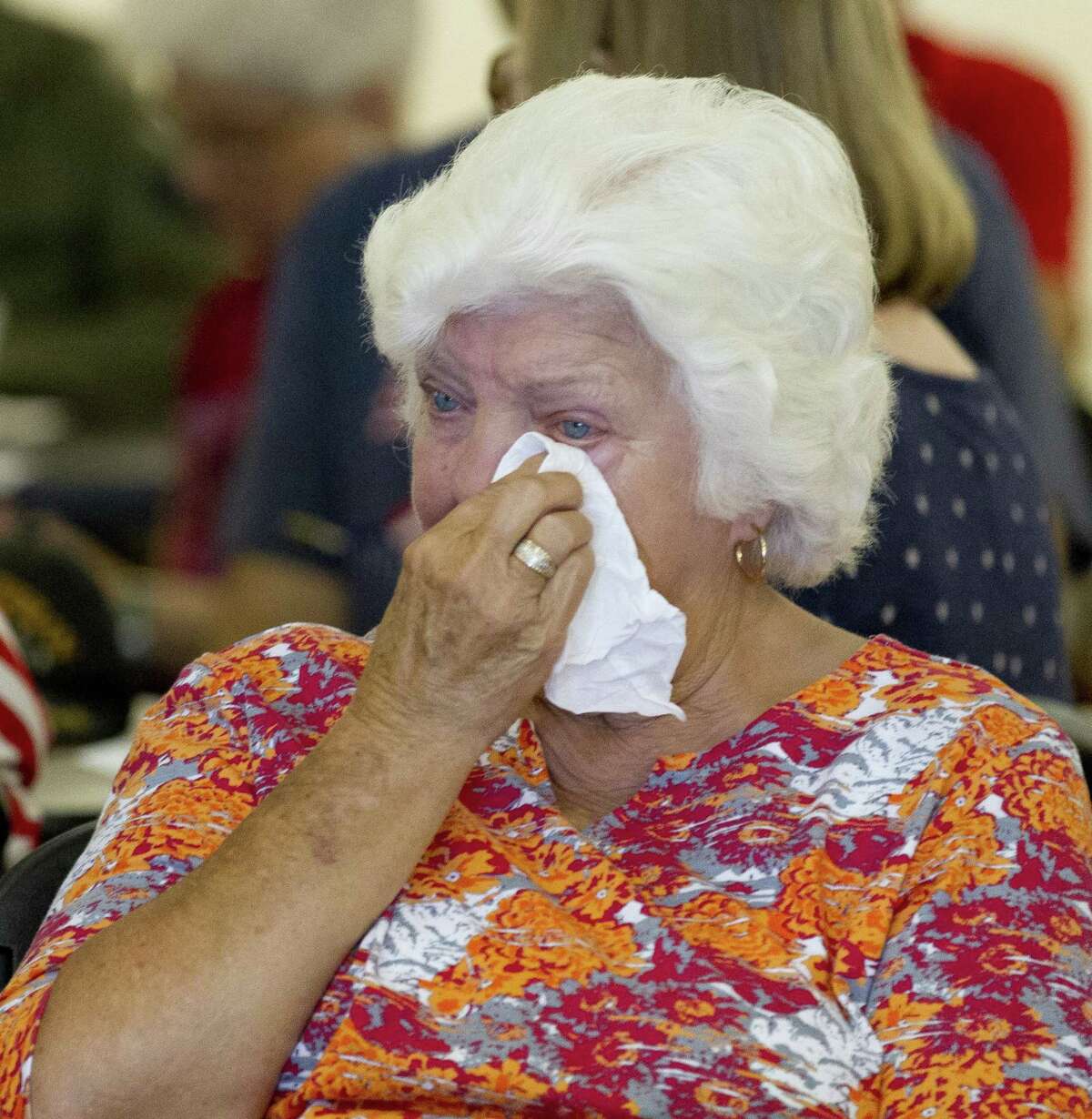 Barbara Hitchens wipes away tears during a Memorial Day ceremony hosted by American Legion Post 411, Monday, May 27, 2019, in Conroe. Hitchens’ grandson, Jason Karella, was killed in action while serving as a Marine in Afghanistan in 2008.