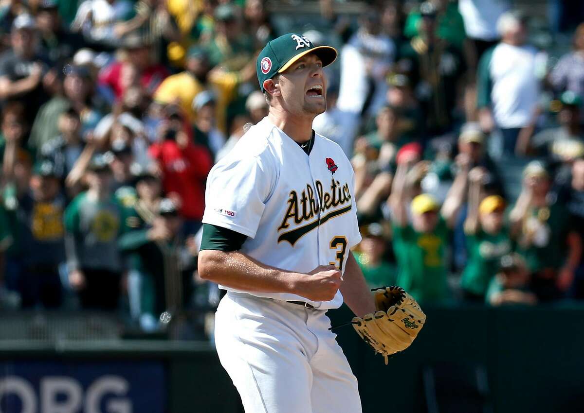 Closer Blake Treinen lets out a yell after the Oakland A’s recorded the final out against the Los Angeles Angels at the Coliseum to extend the team’s winning streak in Oakland, Calif. on Monday, May 27, 2019.