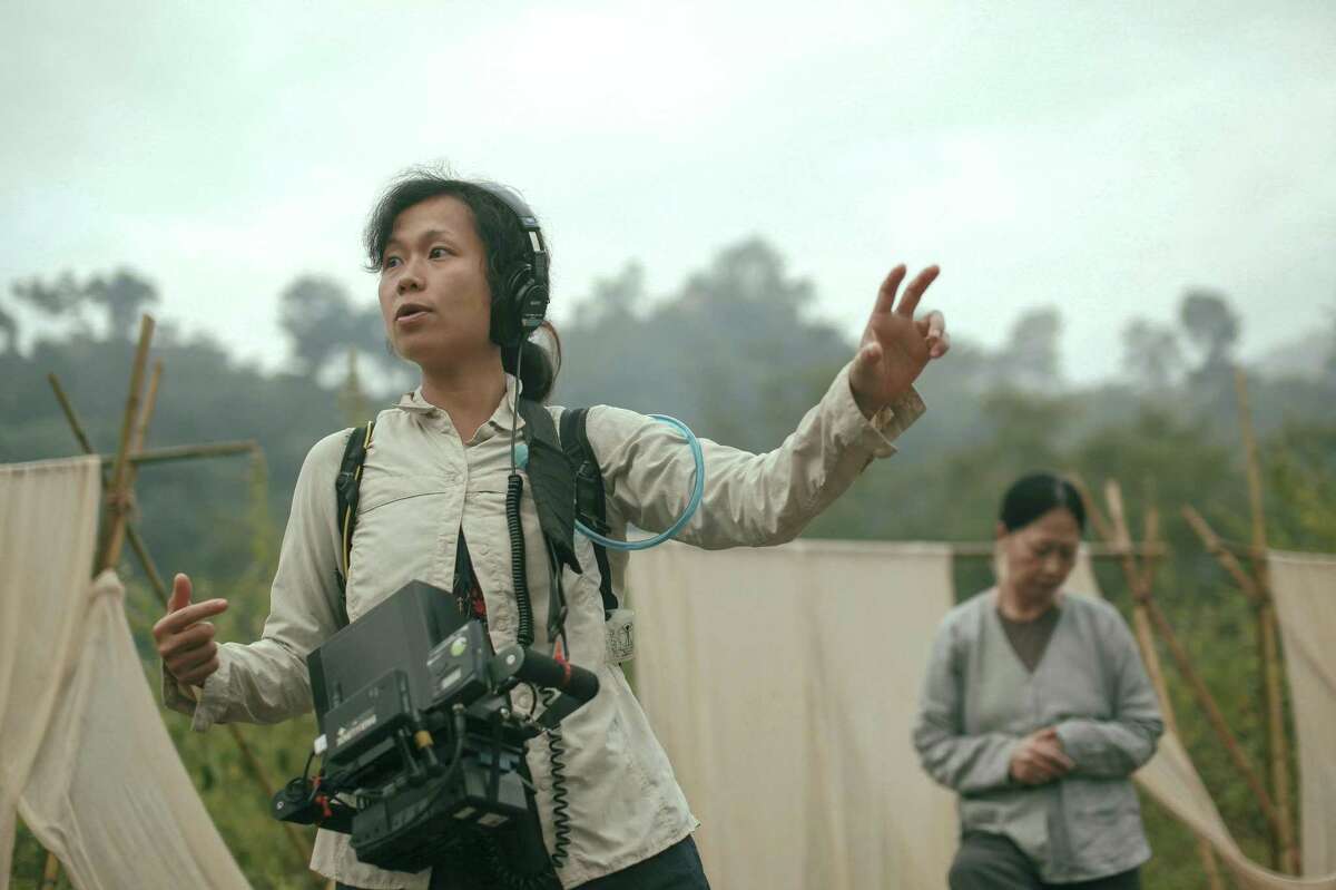 Director Ash Mayfair directs a scene on the set of 'The Third Wife' (Nguoi Vo Ba). This is her first feature film.