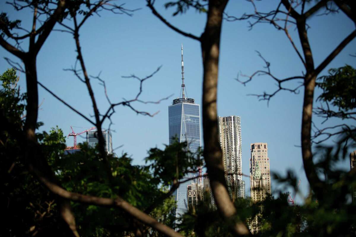 One World Trade Center stands in the lower Manhattan skyline as seen from Main Street Park in the Brooklyn borough of New York, U.S., on Wednesday, May 22, 2019. Stocks slumped globally on Thursday and traders took refuge in gold and bonds as the simmering trade dispute between the world's two largest economies took a greater toll on markets. Photographer: Michael Nagle/Bloomberg