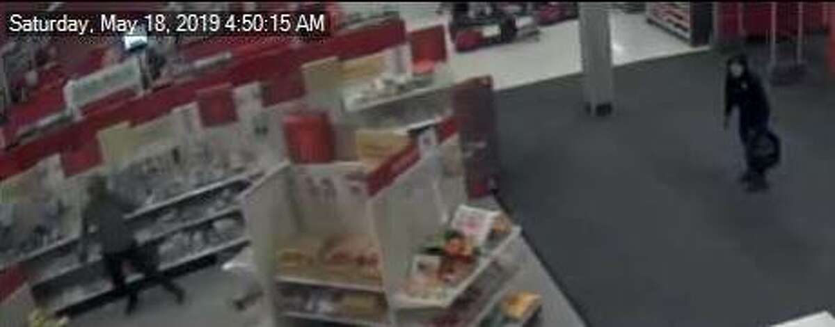 Two men are seen allegedly breaking into a Target in The Woodlands.
