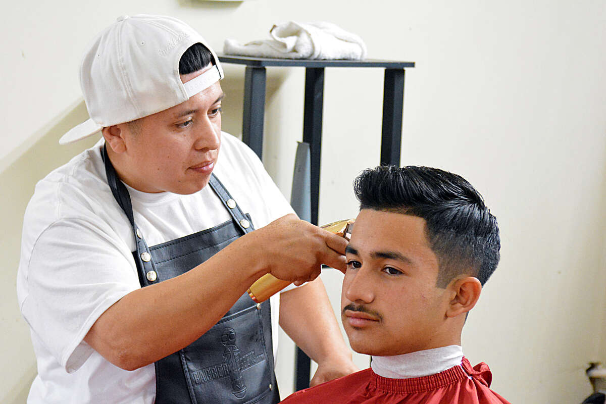 Taking it national Plainview's Camargo competes in Connecticut Barber Expo