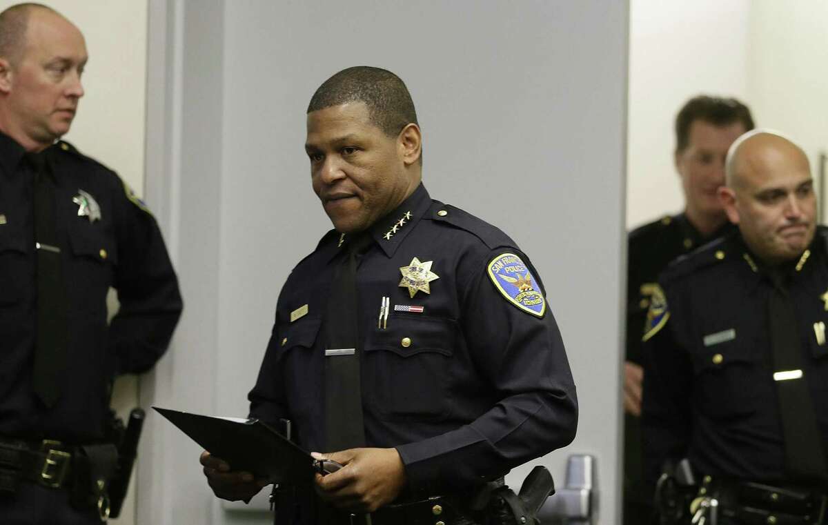 San Francisco Police Chief William Scott, foreground, walks to the podium at a news conference, Tuesday, May 21, 2019, in San Francisco.