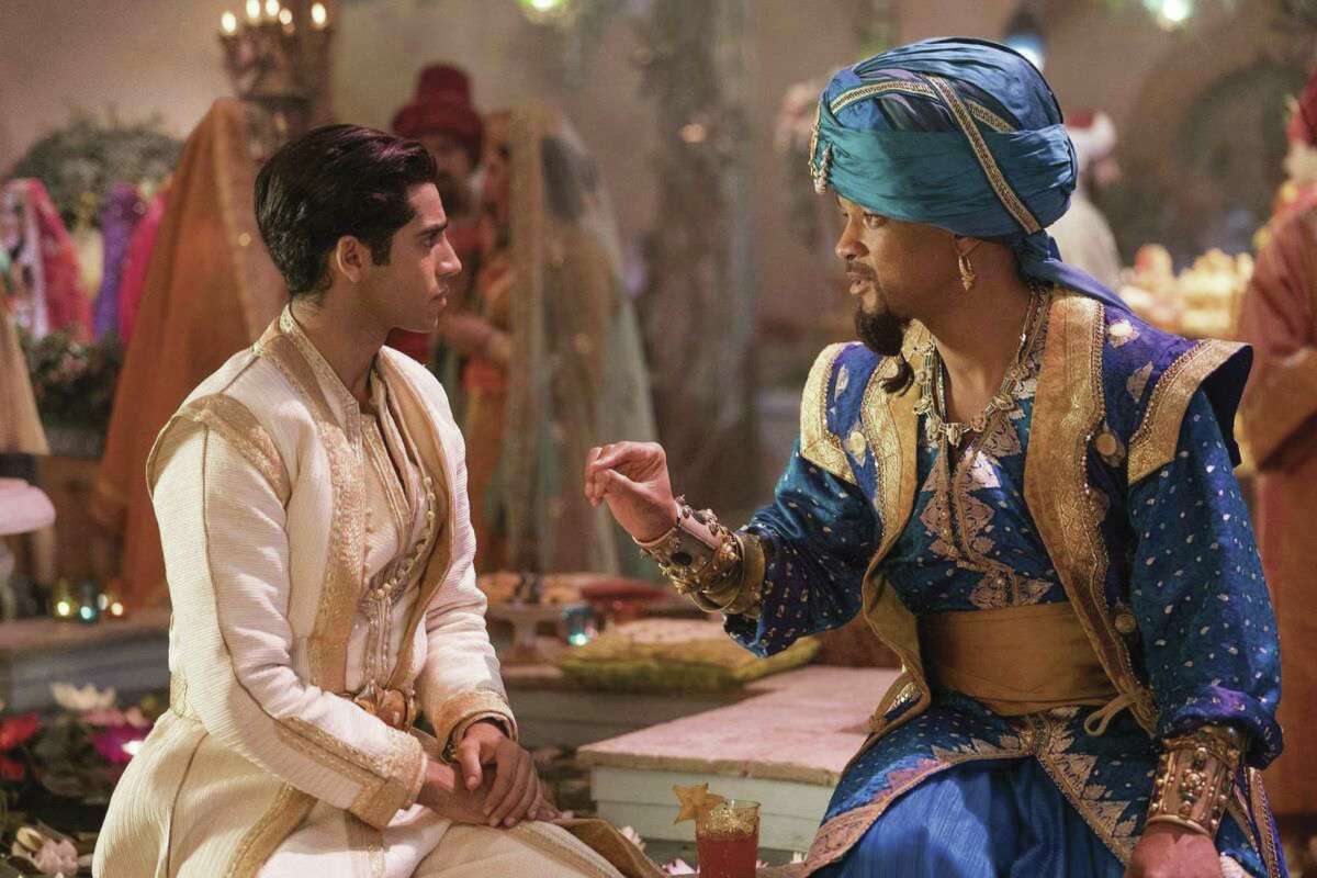 Danny Minton calls the live-action “Aladdin” the most fun he’s had at the movies so far in 2019. Here Mena Massoud is Aladdin and Will Smith plays the Genie.