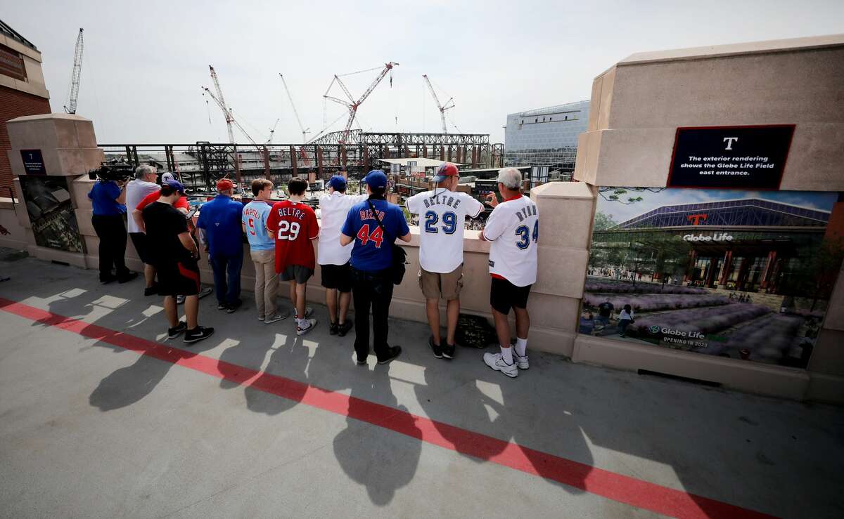 PHOTOS: Houston Astros fan giveaways for 2019 season  ARLINGTON, TEXAS - MARCH 28: Fans observe the construction site of the new Globe Life Field before the Texas Rangers take on the Chicago Cubs during Opening Day at Globe Life Park in Arlington on March 28, 2019 in Arlington, Texas. (Photo by Tom Pennington/Getty Images) >>>See all the Astros fan freebies remaining this season ... 