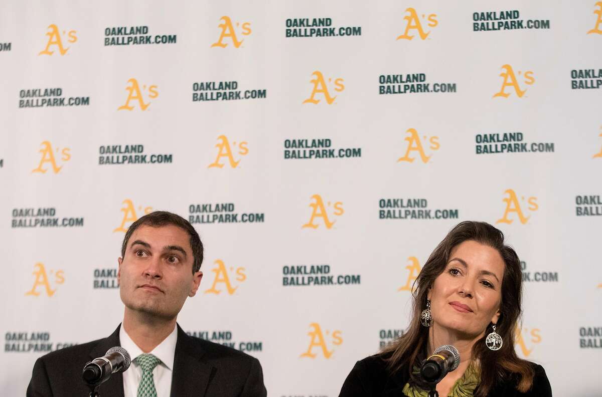 A’s President Dave Kaval (left) and Oakland Mayor Libby Schaaf take questions during a press conference in 2018.