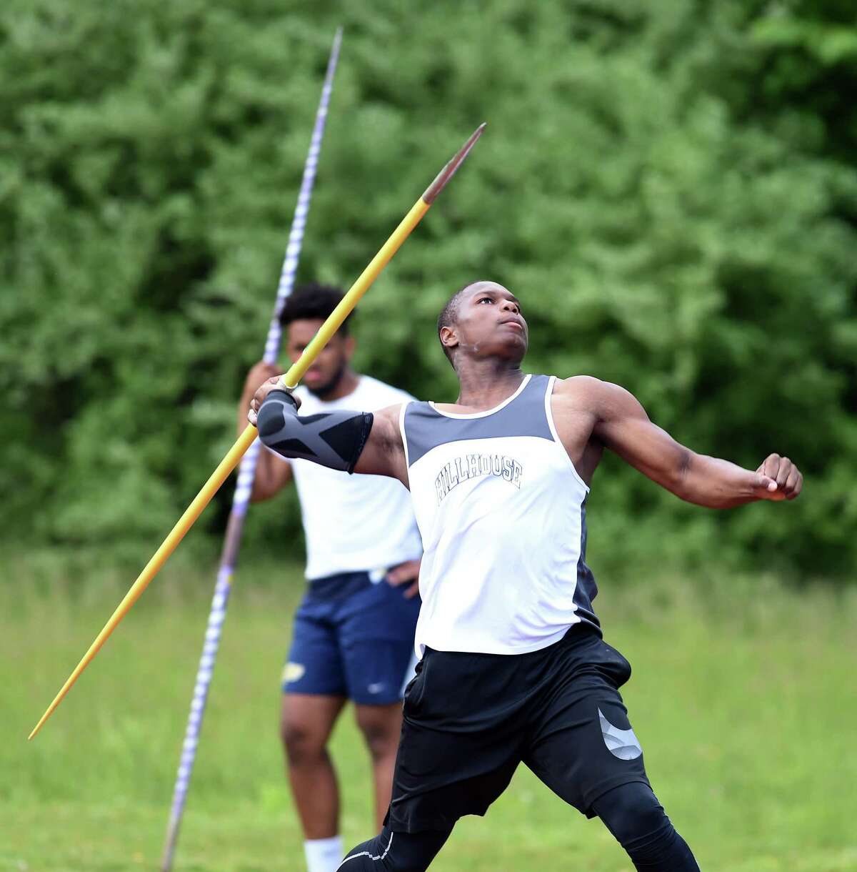 Hillhouse’s Gary Moore, Jr., throws the javelin during the Class MM outdoor track and field championship on May 29 at Middletown High.