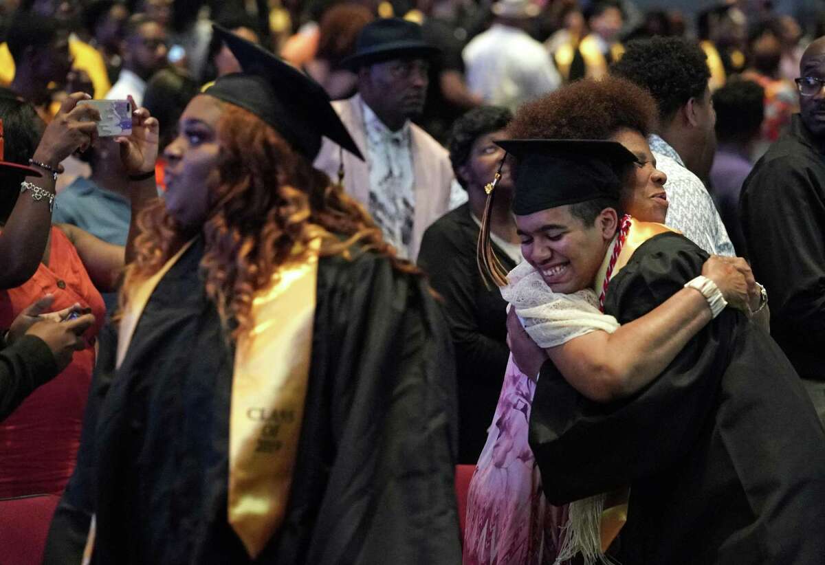 Thurgood Marshall High School students line up for graduation ceremony at Smart Financial Centre, 18111 Lexington Blvd., Saturday, May 25, 2019, in Sugar Land.