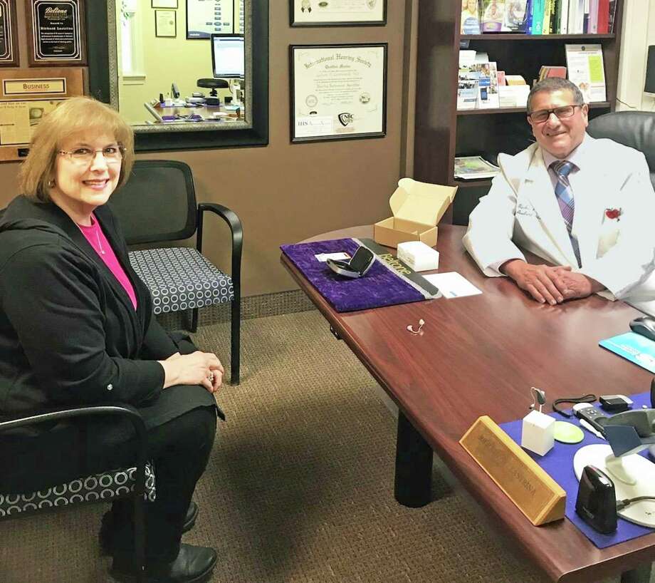 Loreen Barone was fit with her new hearing aids last week at The Beltone Hearing Center, 769 Newfield St., Middletown. She’s shown with Michael Andreozzi, CEO of Beltone New England. Photo: Contributed Photo