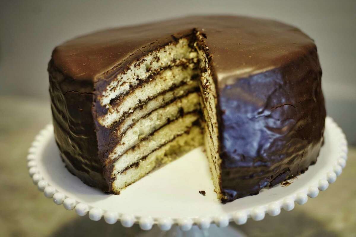 A view of a six-layer doberge cake glazed with chocolate ganache at Palette Cafe on Thursday, May 30, 2019, in Saratoga Springs, N.Y. (Paul Buckowski/Times Union)