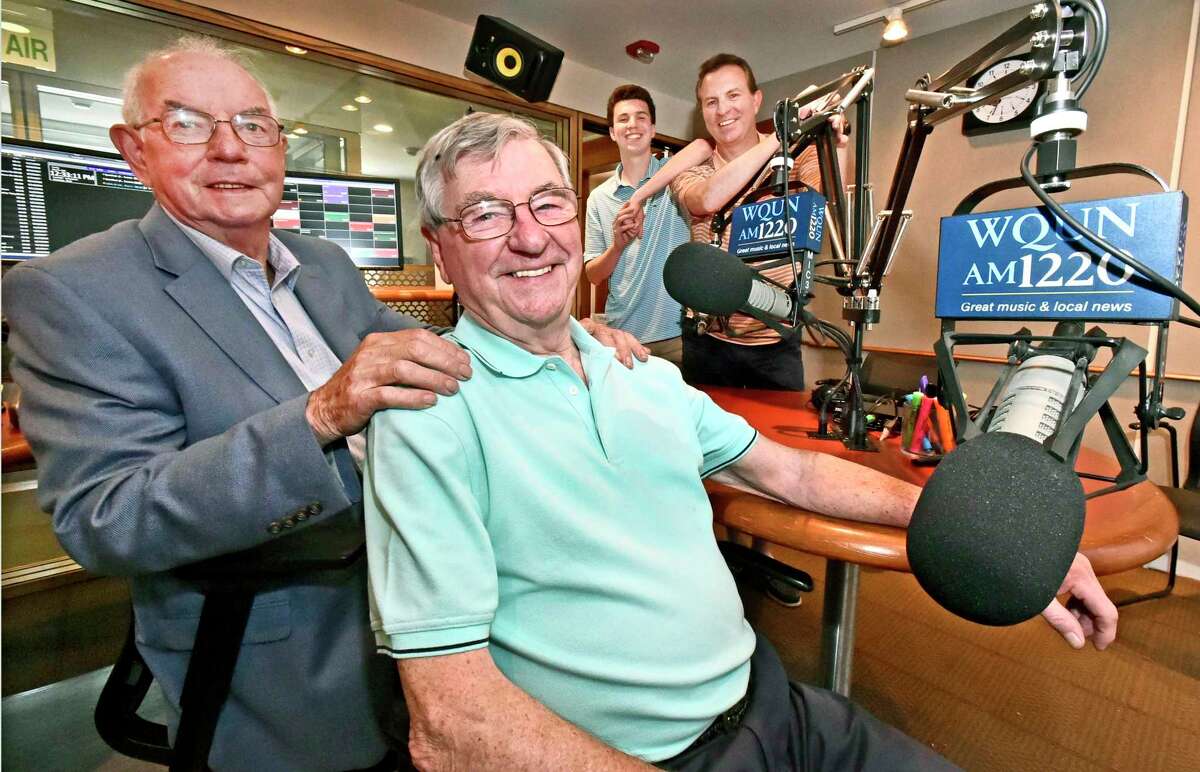 Sean Canning, 83, of Wallingford, radio host of “The Sounds of Ireland” program on WQUN, front right, with co-hosts Tom Faherty, 78, of North Haven, front left, his grandson Brendan T. Canning, 16, rear left, and son Brendan F. Canning, 50, both of Wallingford, airs his last show in May 2019 after a 44-year run with the closing of the community radio station by Quinnipiac University.