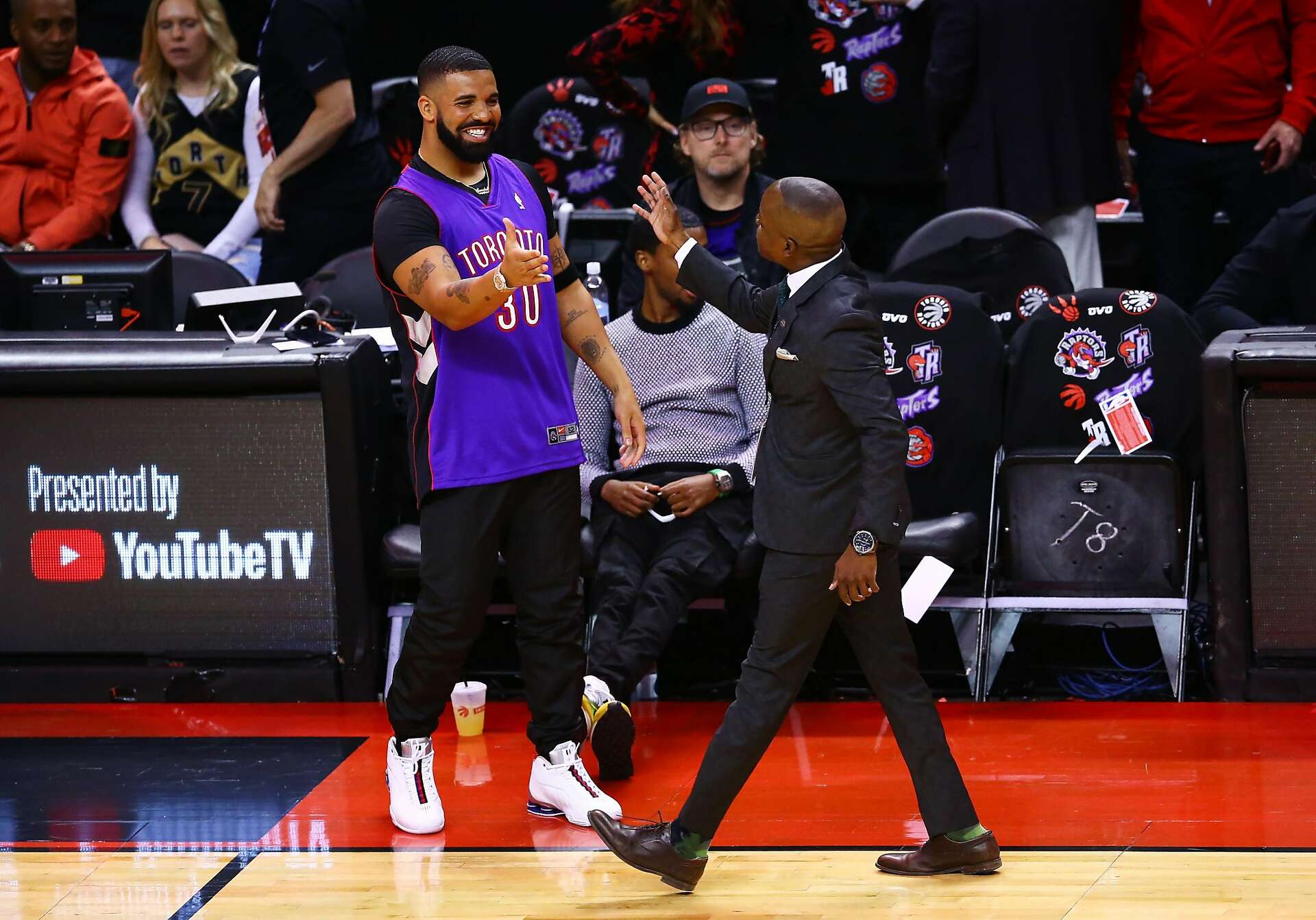 Drake is definitely covering up his Warriors tattoos for the NBA Finals