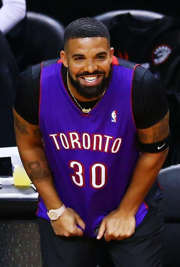 Rapper Drake is seen wearing a Dell Curry jersey before Game One of the 2019 NBA Finals between the Golden State Warriors and the Toronto Raptors at Scotiabank Arena on May 30, 2019 in Toronto, Canada. Photo: Vaughn Ridley / Getty Images