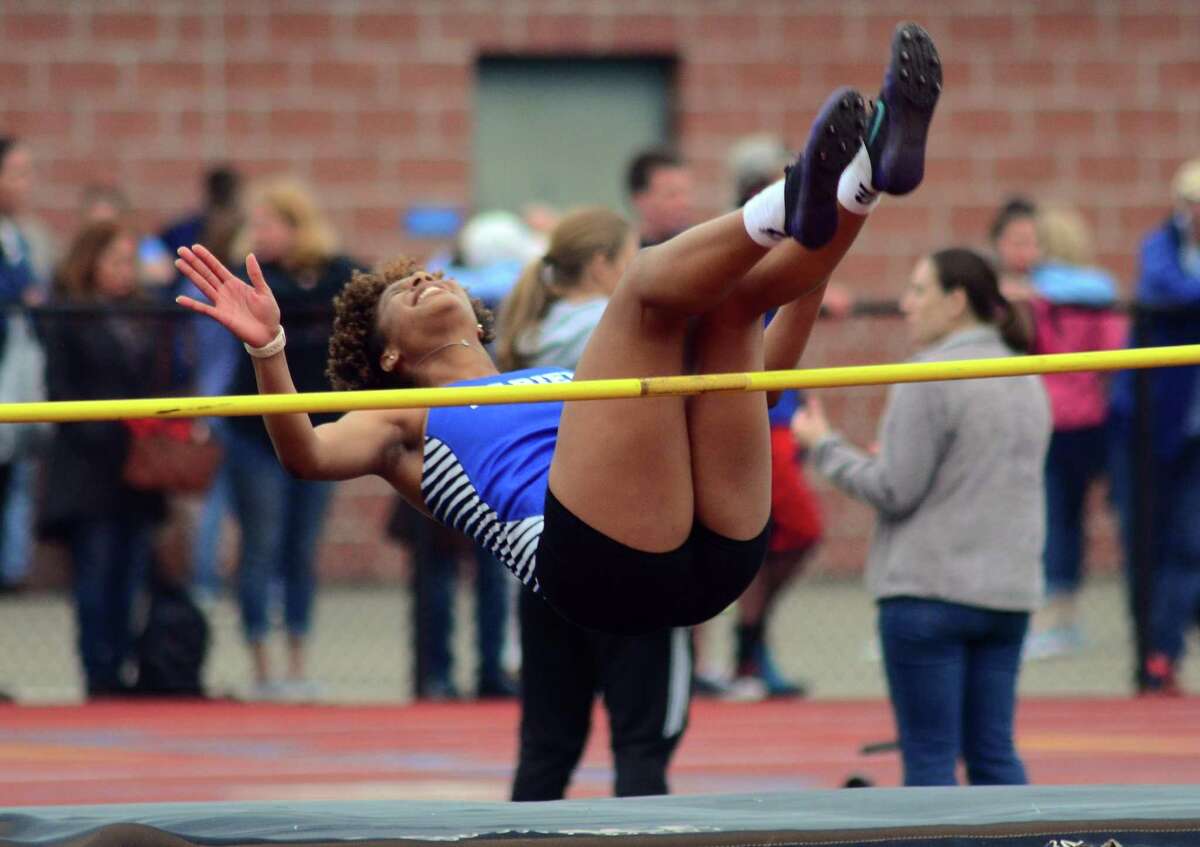 Darien's Chelsi Chevannes competes in the high jump during Class L Track and Field Championship action in Middletown, Conn., on Thursday May 30, 2019.