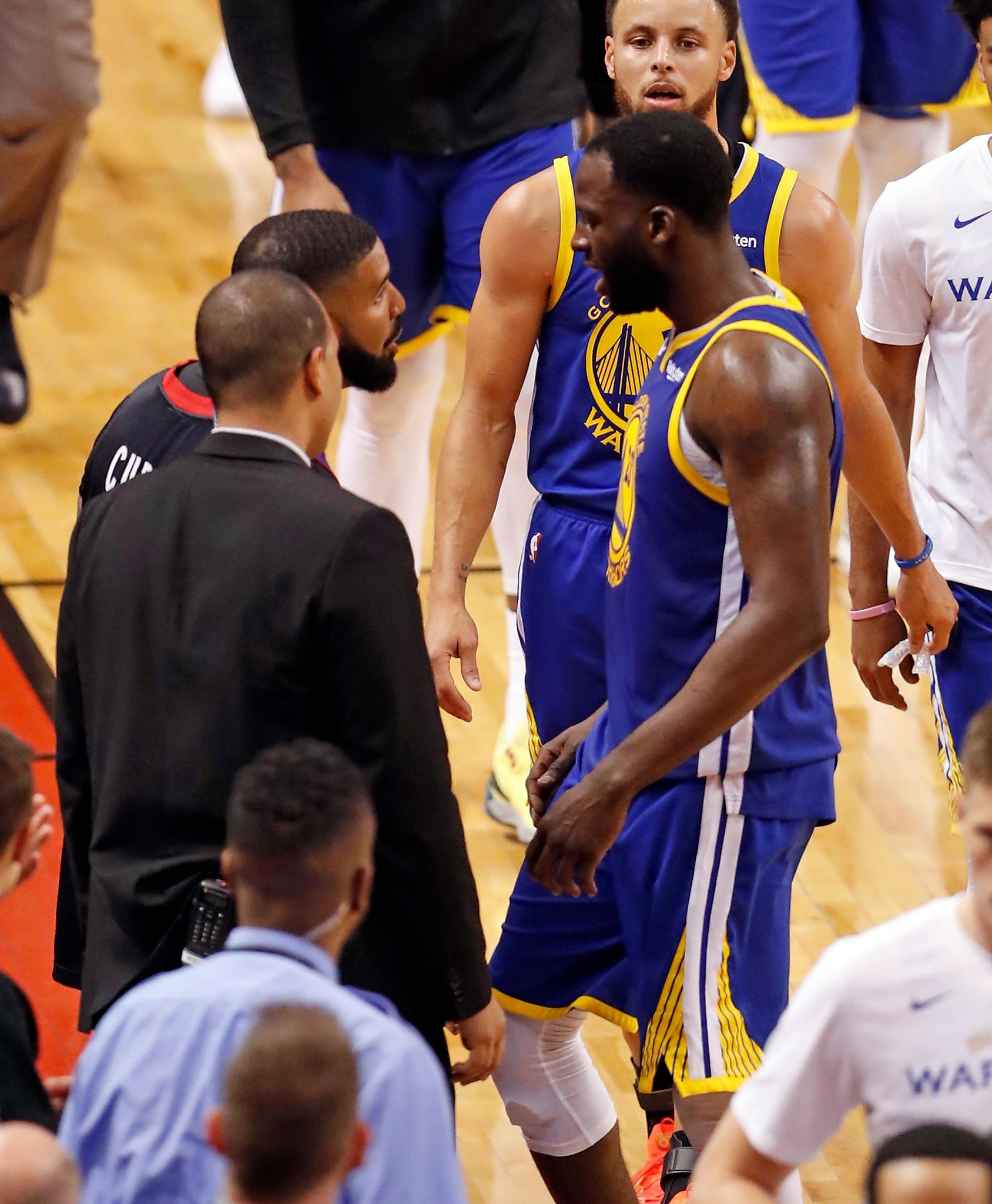 Watch: Drake, Draymond Green have heated exchange after Game 1