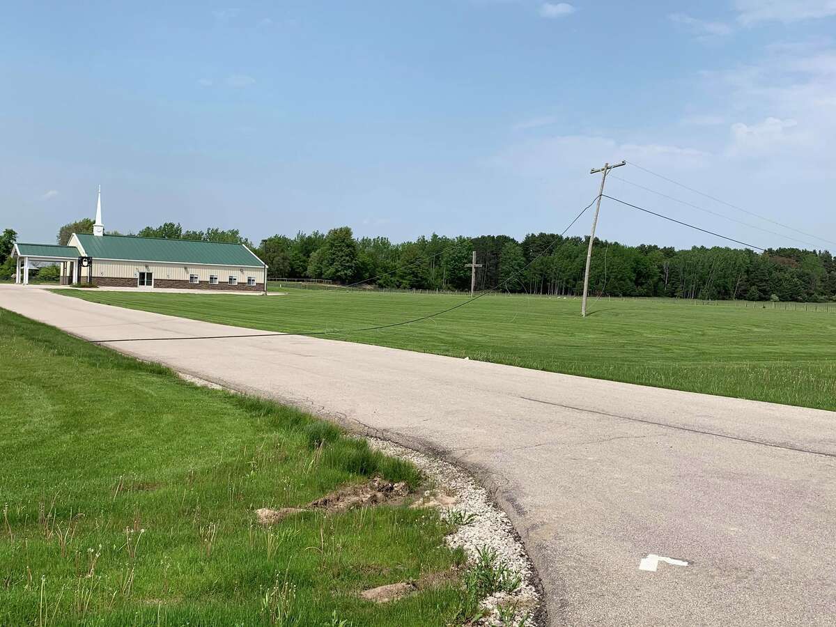 Vehicle crash damages utility lines, closes Eastman Avenue