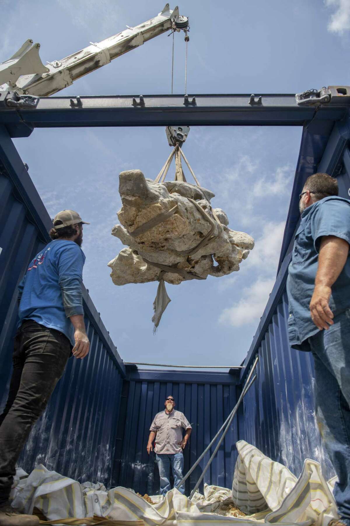 A crane was used to swiftly pull a six-and-a-half ton Scholars’ Rock from a container. The rock — which comes from a quarry near Wuxi, China — will be installed at the back of the San Antonio Museum of Art campus in November.