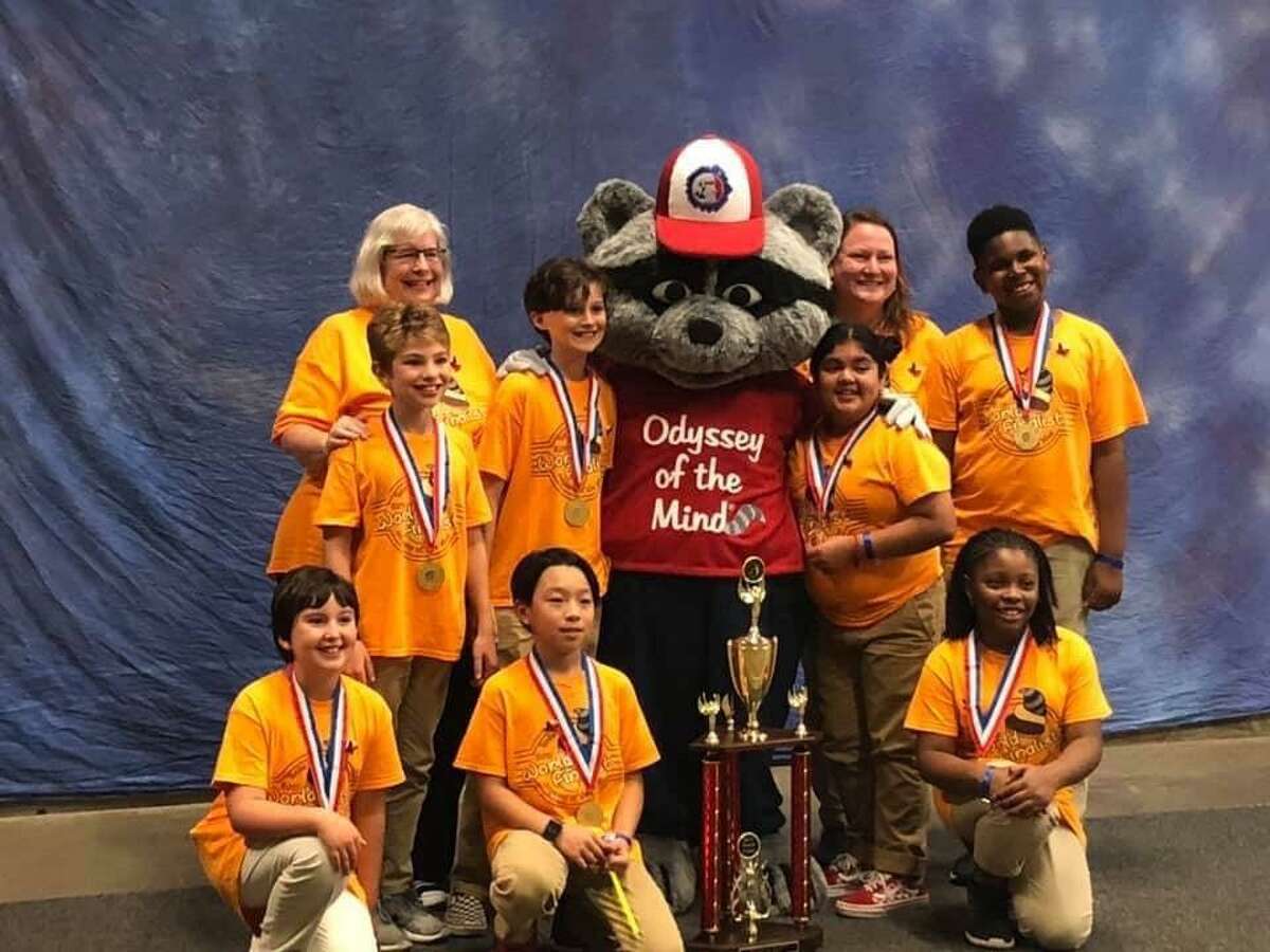 The Walnut Bend Elementary School team took home first place in their division at the 2019 Odyssey of the Mind World Finals May 22-25 at Michigan State University. Here, Principal Michele Dahlquist (pictured back from left) Brody, Elliot, Melyna, Assistant Penny Blair, Jeremy; Daniella (front from left) Hans and Clarke pause for a moment to take it all in.