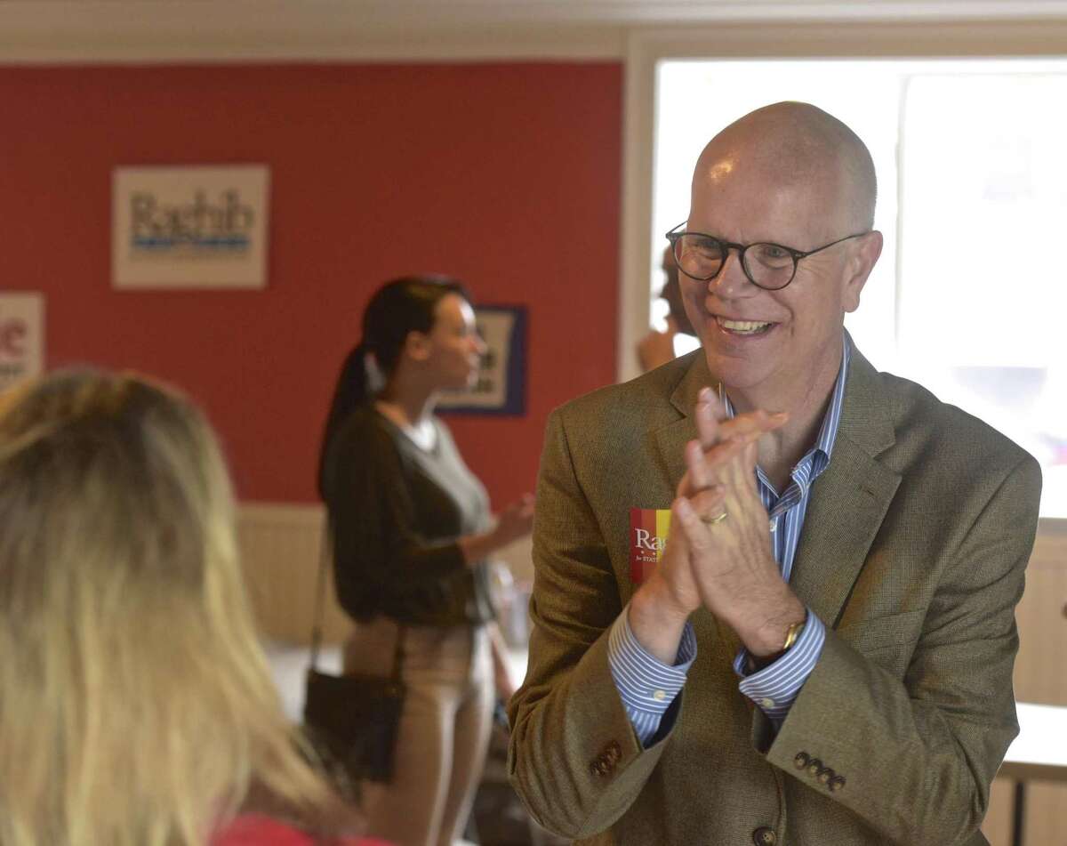 State Comptroller Kevin Lembo, right, held a LGBTQ day of action with Raghib Allie-Brennan, a Democrat running for the state House in the 2nd District. Saturday, October 6, 2018, Bethel, Conn.