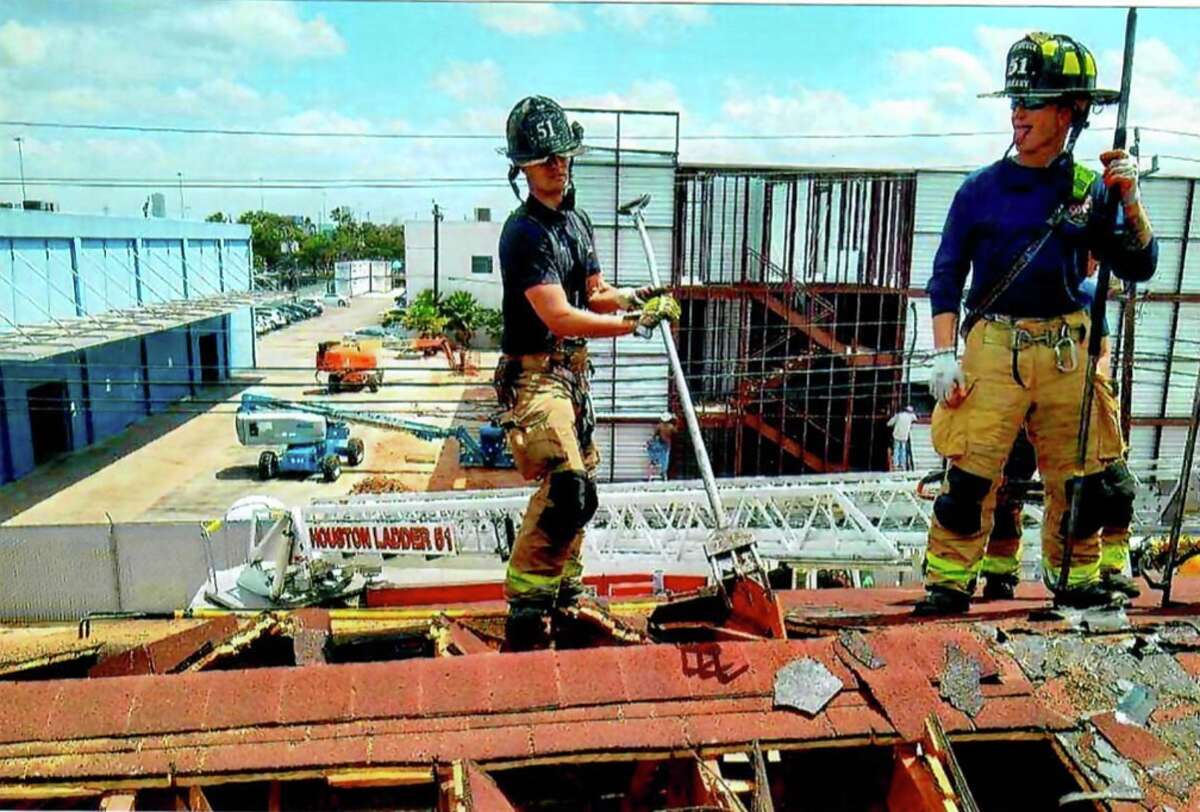 HFD, loved ones return to Southwest Inn fire site to remember fallen