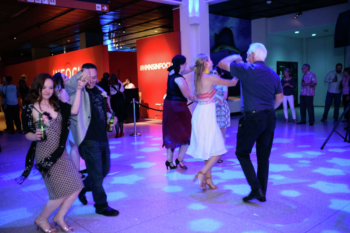 Guests party with dinosaurs at Houston Museum of Natural Science's