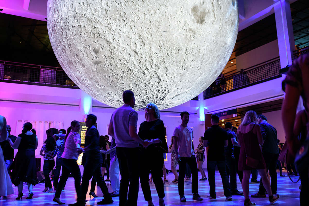 Guests party with dinosaurs at Houston Museum of Natural Science's
