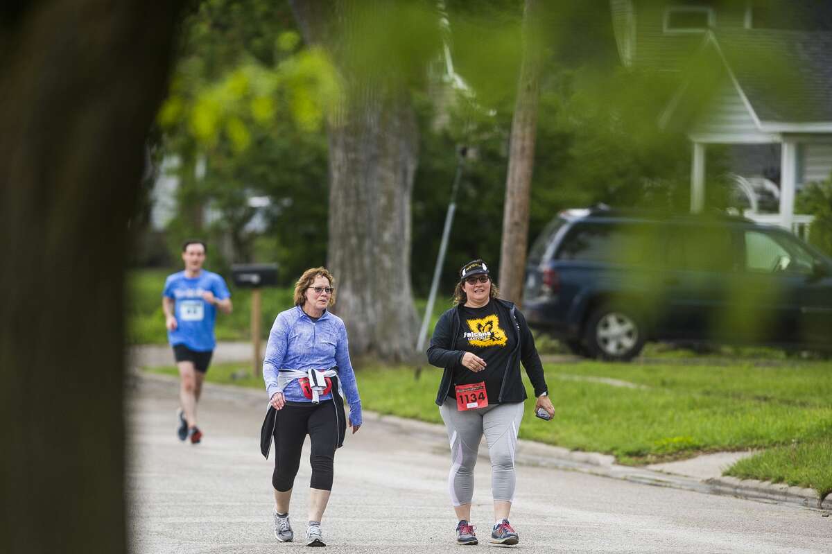 Runners and walkers participate in the Dow RunWalk on Saturday, June 1, 2019 in Midland. (Katy Kildee/kkildee@mdn.net)