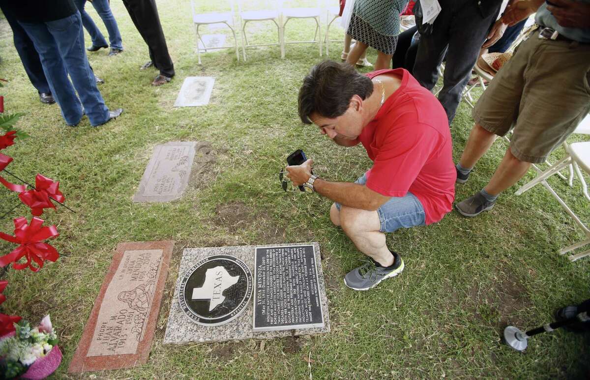 David Davila, grandson to Ms. Lydia Mendoza pays his respect before the ceremony began. The Texas Historical Commission will recognize late musician Lydia Mendoza with an official historical marker at San Fernando Cemetery #2 on Saturday, June 2, 2019