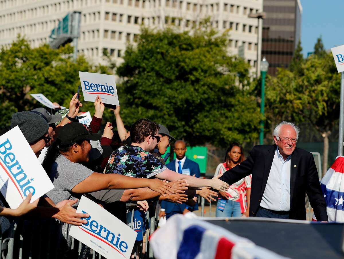 U.S. Senator and presidential candidate, Bernie Sanders makes is way onto the stage at a campaign rally in San Jose, California on June1, 2019.