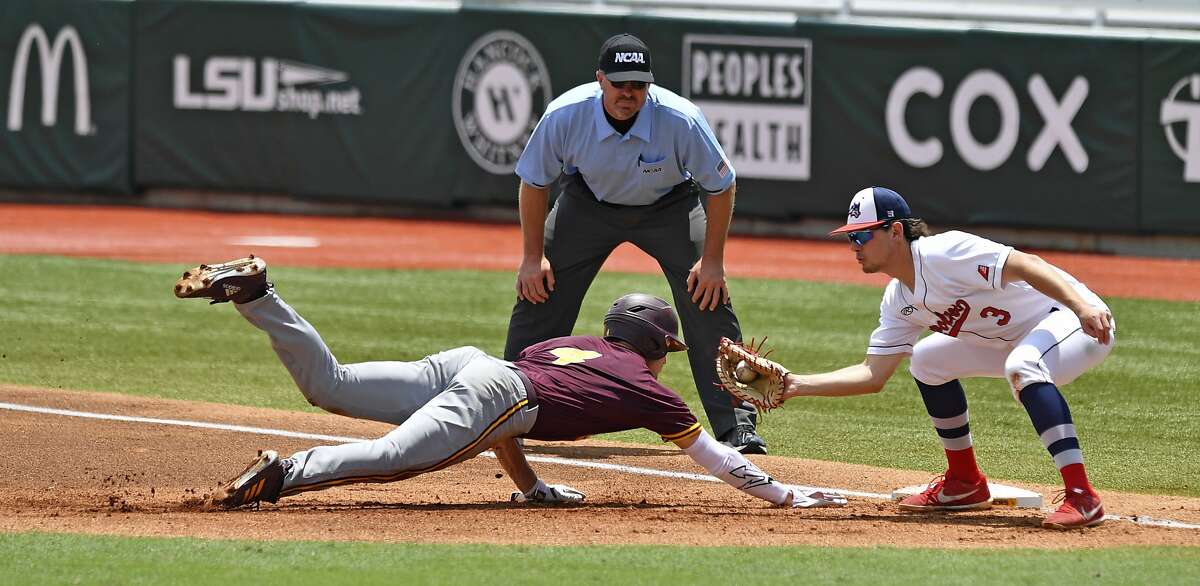 Arizona State's Hunter Bishop (4) is safe on a pickoff-attempt. The San Francisco Giants used the 10th pick in this year's amatuer draft to take Bishop, who attended Serra High in San Mateo. 