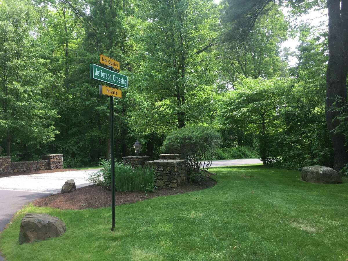 Outside Fotis Dulos' Jefferson Crossing residence in Farmington, Conn., on June 1, 2019.  The 10,000-square-foot, six-bedroom house in Farmington is being listed as part of the sell-off of the estate of Fotis Dulos, a luxury home builder who took his own life in January while facing a murder charge, The Hartford Courant reported Saturday. Jennifer Dulos' body has still not been found. Fotis Dulos attempted suicide at the house and died two days later. The couple moved into the home in 2012. Jennifer Dulos moved out with the children in 2017, court records say.