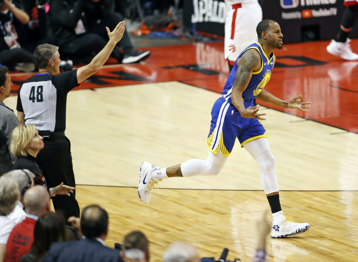 Golden State Warriors' Andre Iguodala reacts to his game-clinching 3-pointer against Toronto Raptors in final seconds of 4th quarter of Warriors' 109-104 win in NBA Finals' Game 2 at ScotiaBank Arena in Toronto, Ontario, Canada, on Sunday, June 2, 2019.