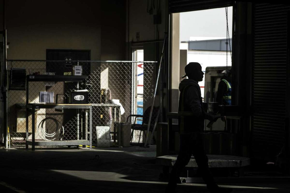 Employees work in a the transportation and logistics company's warehouse on Thursday, Feb. 1, 2018, in El Paso, Texas. Companies across Texas could be among the hardest hit in the country by tariffs on Mexican goods due to the highly integrated supply chains with Mexico relative to other areas of the U.S.
