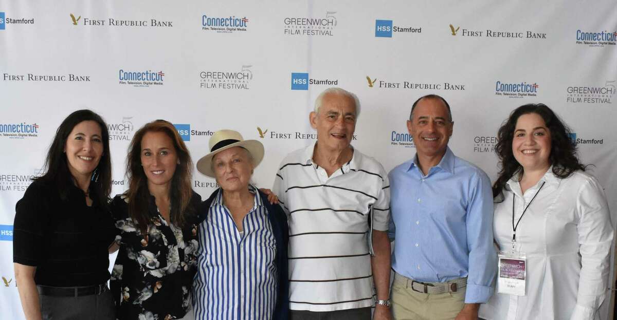 From left, Mary Jane Rein, Rebecca Colin, Bobsey Colin, Steve Corman, Michael Bergenfeld and Shari Angel all pose outside the Greenwich International Film Festival screening of "Touching the Sky," a documentary about female Israeli soldiers who had to overcome so much to get through the exclusive Israeli Air Force program.