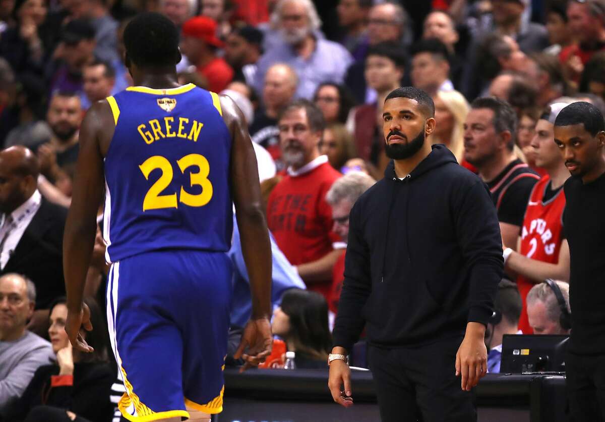 TORONTO, ONTARIO - JUNE 02: Drake reacts in the first half during Game Two of the 2019 NBA Finals between the Golden State Warriors and the Toronto Raptors at Scotiabank Arena on June 02, 2019 in Toronto, Canada. Click or swipe through the gallery to see shots of Drake in action during the NBA Finals. >>>