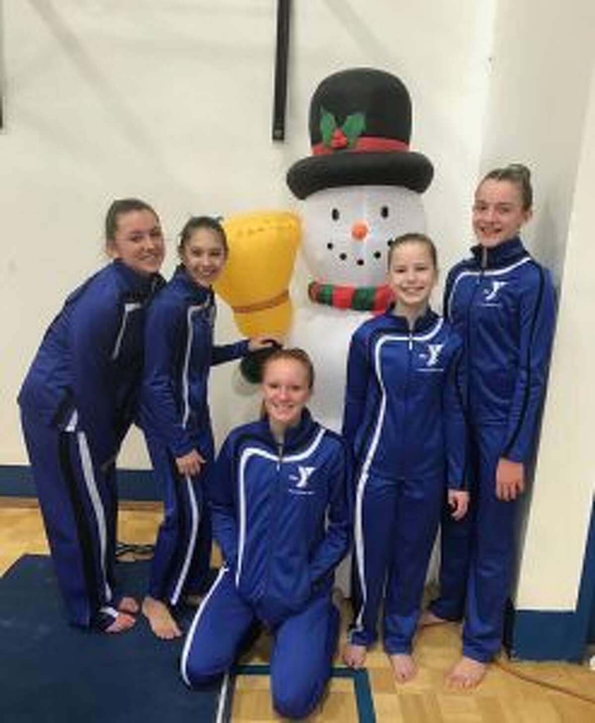 Lakewood-Trumbull YMCA Level 7 team placed second at the YMCA Snowflake Invitational Meet. Pictured are Olivia Hogan, Zosia Kocab, Callan Vaughn, Lindsay Capobianco and Grace Stephens.