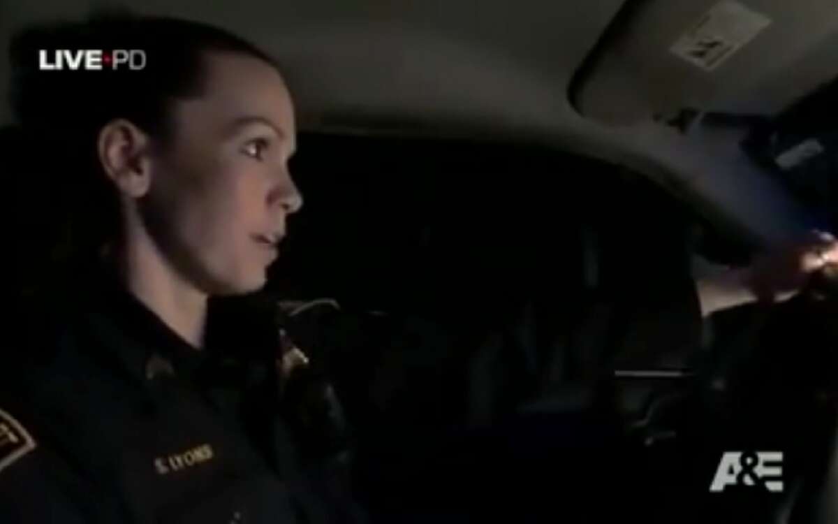 Sergeant Stacey Lyons responds to a domestic violence report in a scene from the A&E police show Live PD.