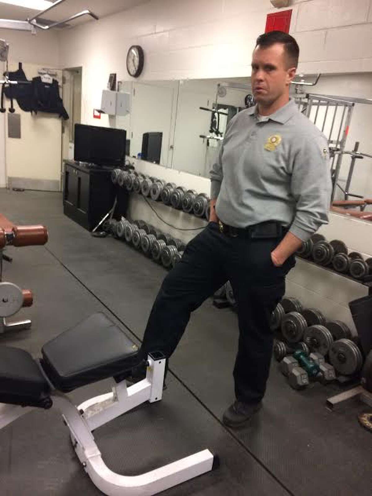 Sgt. Brian Falkenstein and the Trumbull Rotary hope to renovate the Police Department’s 1980s-vintage workout room. — Donald Eng