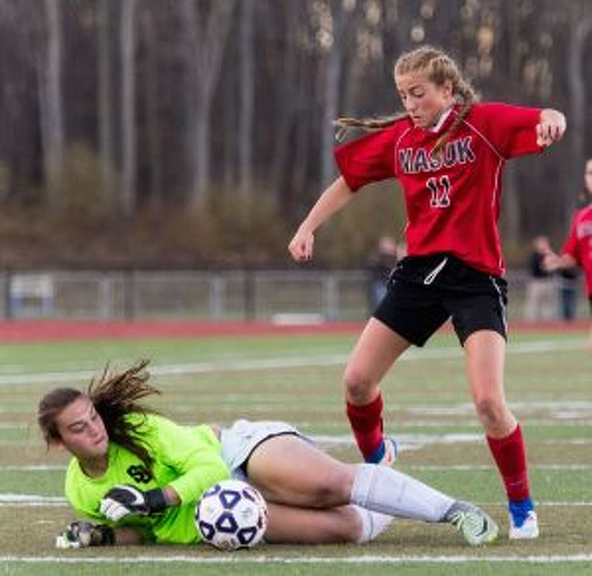 Cadet keeper Veronica O’Rourke makes a sprawling save, as the Panthers’ Giavanna DeLorenzo looks for a rebound.
