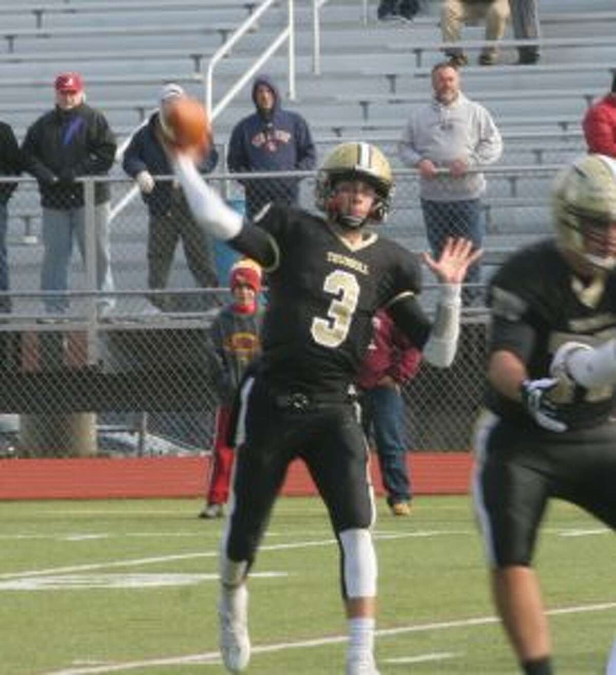 Trumbull's Johnny McElroy threw for four touchdowns. — Bill Bloxsom photos