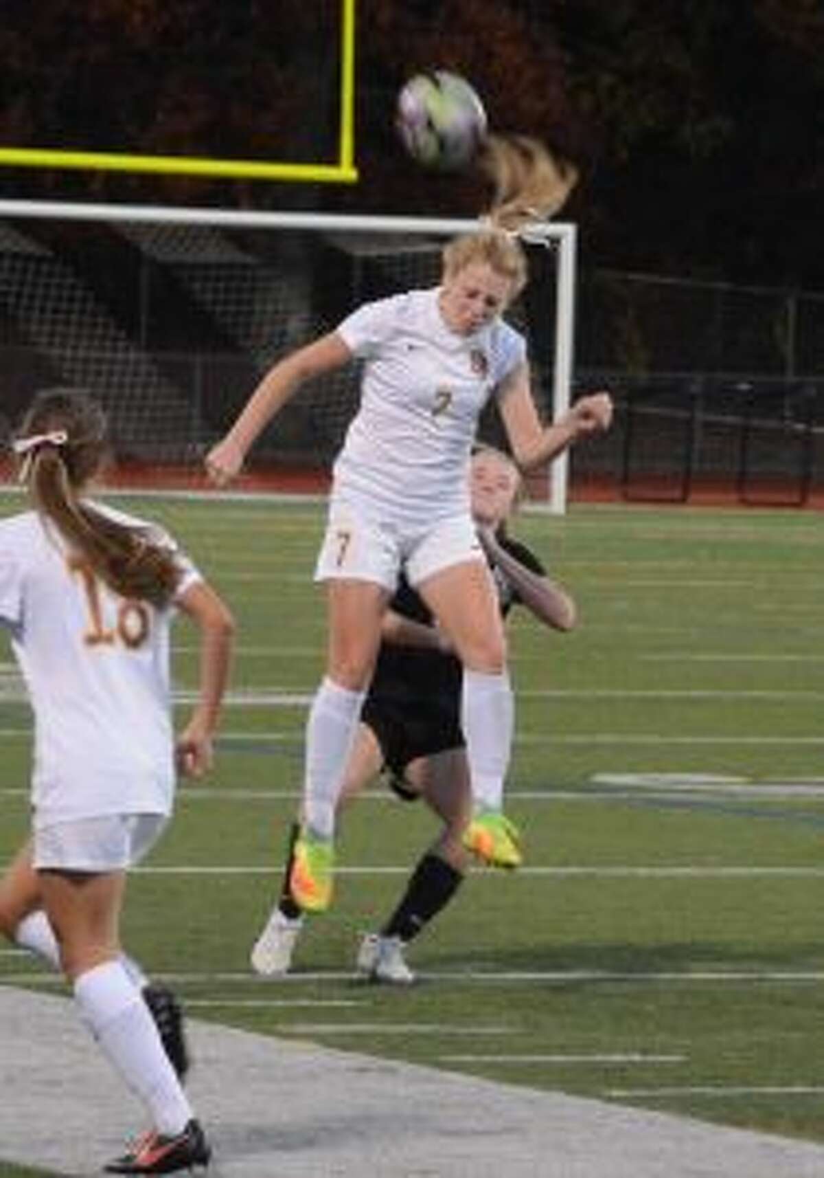 St. Joseph's Hailey Vechiarelli gets her head on the ball in the title game. — Andy Hutchison photo