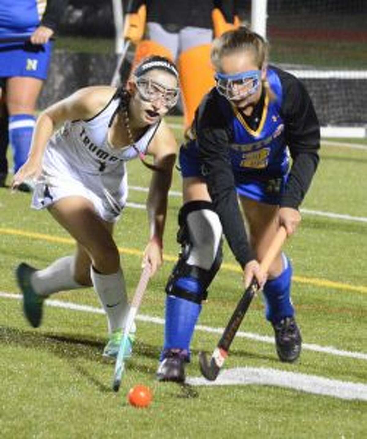 Trumbull's Hayley Adams look to possess ball versus Newtown. - Andy Hutchison photo