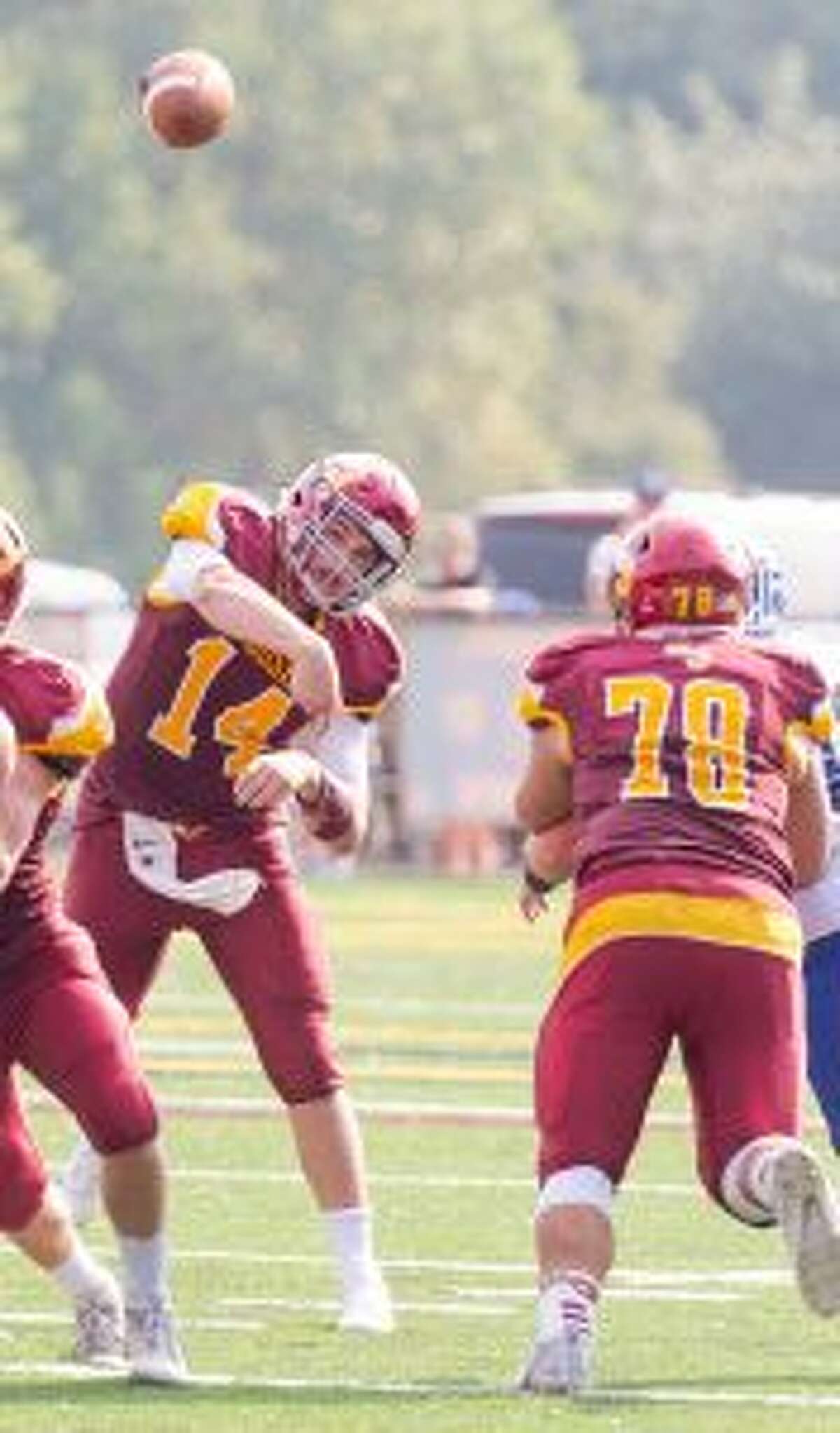 Corey Babineau threw for three touchdowns and ran for another.