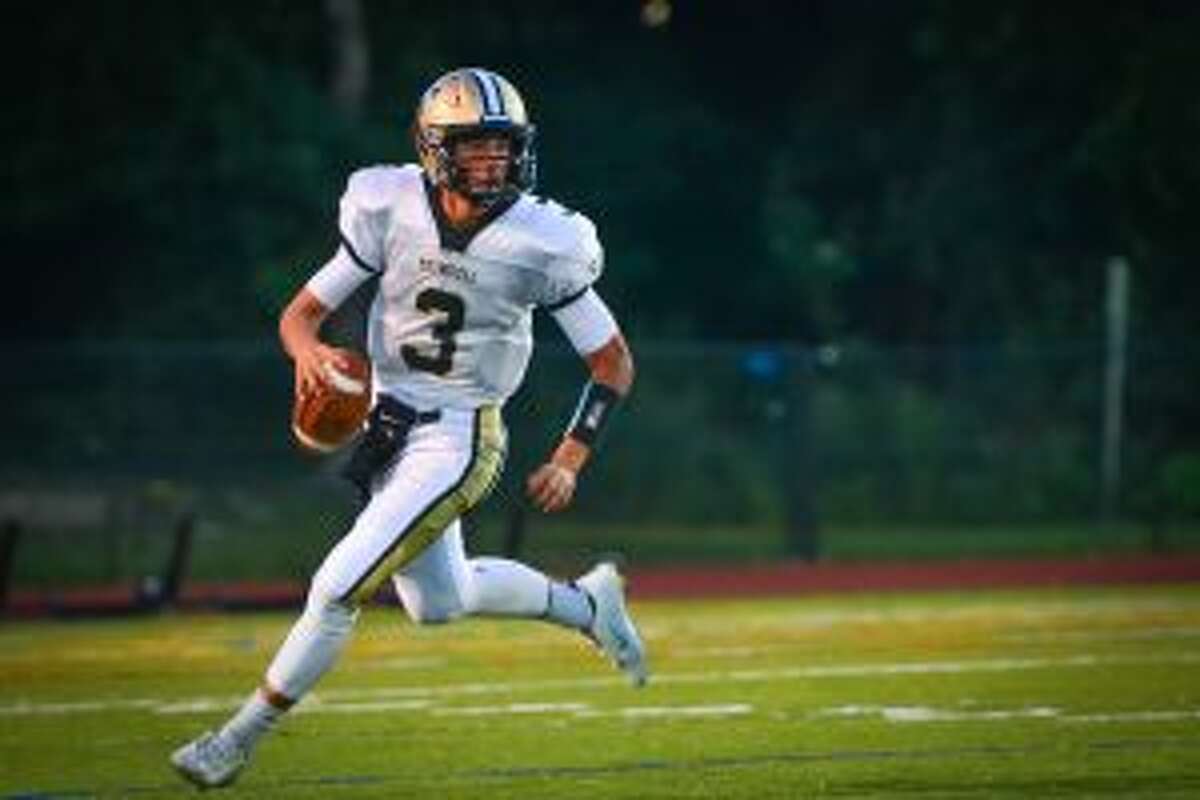 Trumbull's Johnny McEltoy threw for two touchdowns and ran 64 yards for another in the Eagles' win over Trinity Catholic.