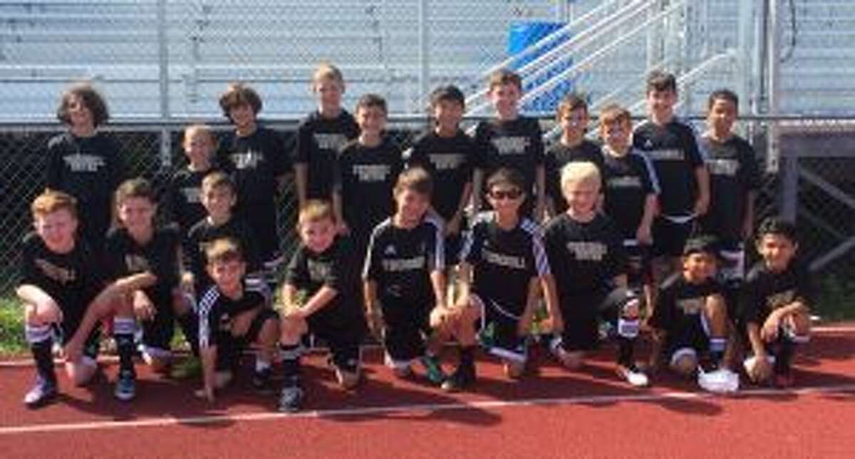 Boys from Trumbull United Soccer Club attended the rivalry match between Trumbull High School and St. Joseph's. Trumbull defeated St. Joe's, 3-0.
