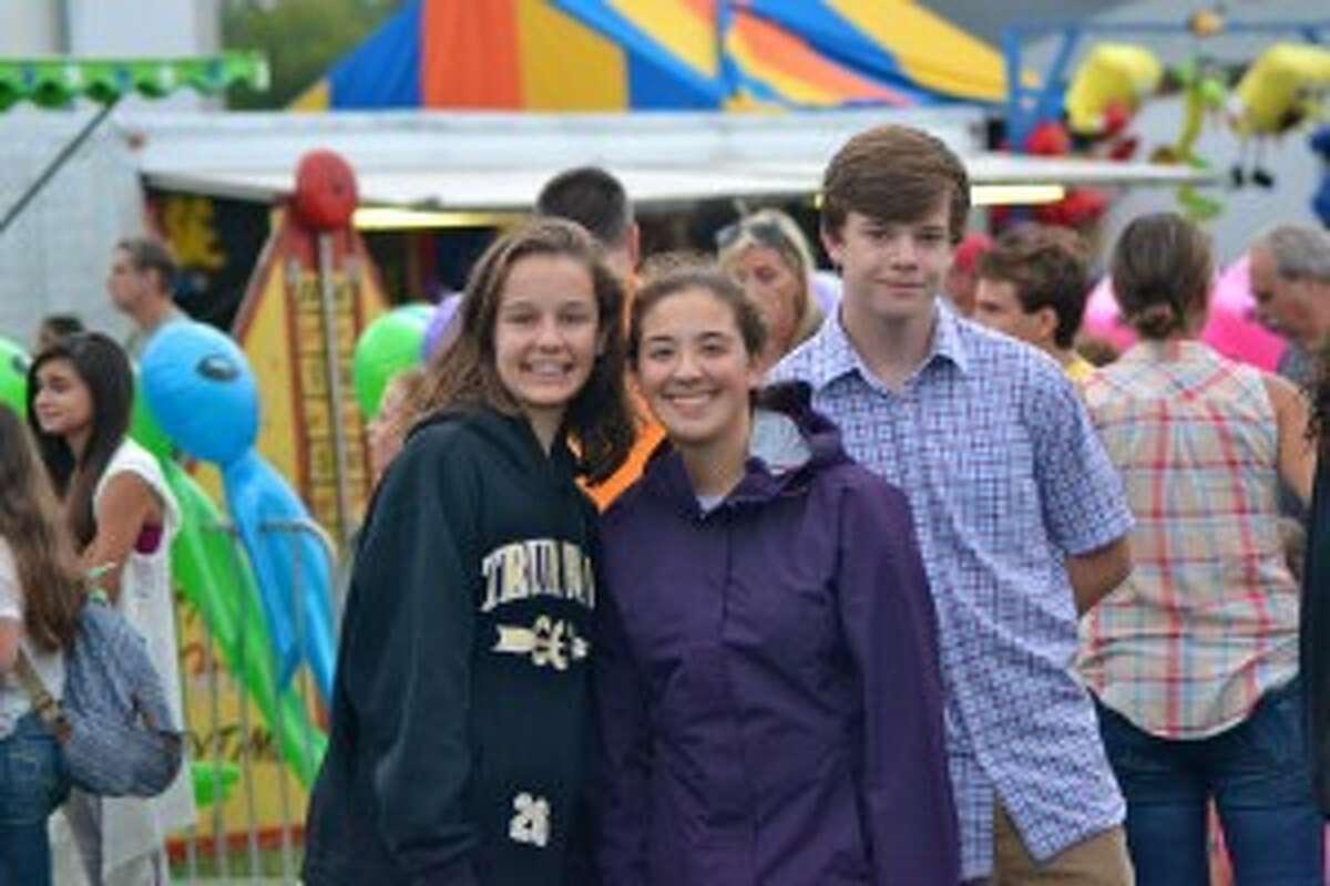 Kate, Maddy and Matthew enjoying Fall Festival 2015. — Lisa Romanchick photo